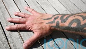 Garda&rsquo;s policy of no visible tattoos to be retained, says Harris