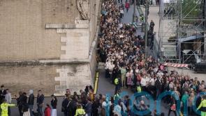Mourners queue overnight to see popular Pope as Vatican extends opening hours