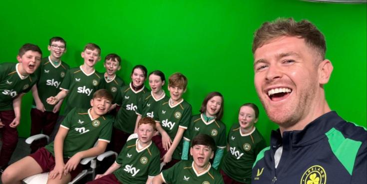 Ireland captain Nathan Collins surprises students from his former primary school in Kildare