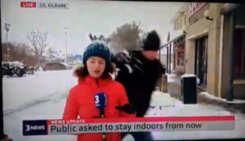 WATCH: Gas moment man hits TV3 reporter with snowball during live Kildare broadcast