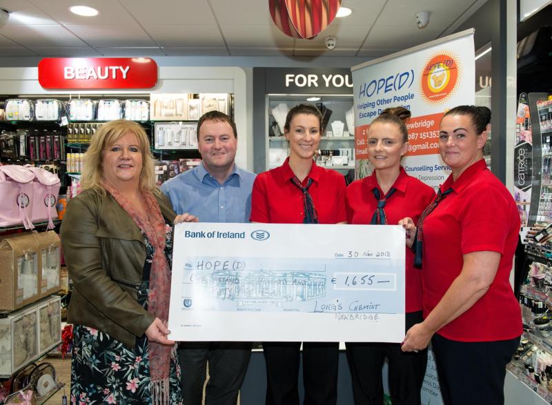 Newbridge pharmacy hand over cheque for €1,655 to Hope (D)