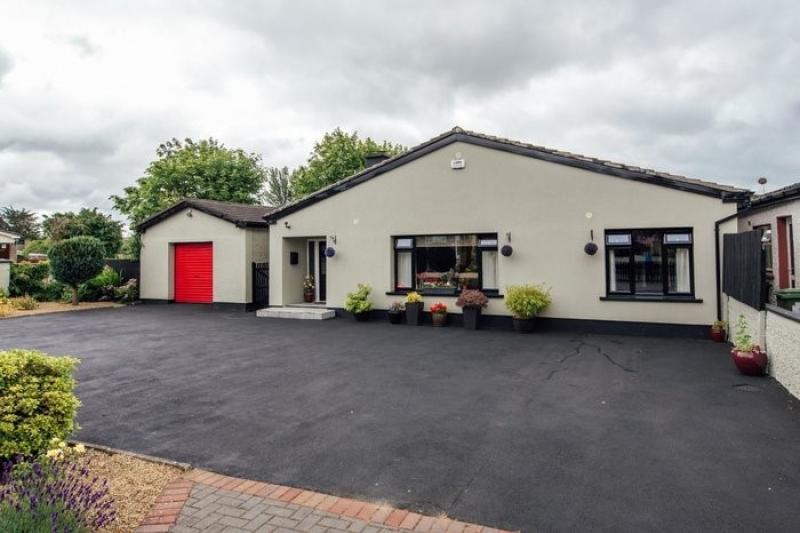 Lovely 3-bed bungalow in Newbridge with detached garage and manicured gardens for €320K