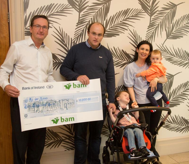 Local workers raise money for seriously ill child 