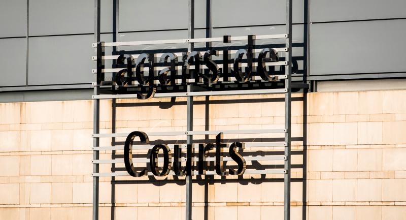 Two men due to appear in court on terrorism charges connected with New IRA probe