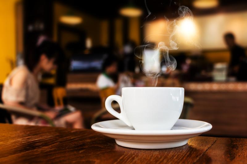 Coffe-Mug-on-a-Table-in-a-Coffee-Shop