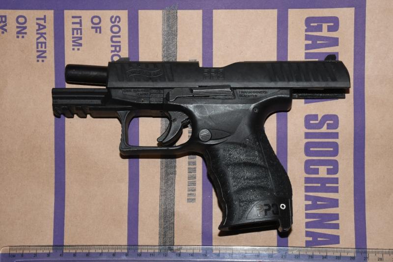 Garda&iacute; arrest two men after discovery of loaded semi-automatic weapon