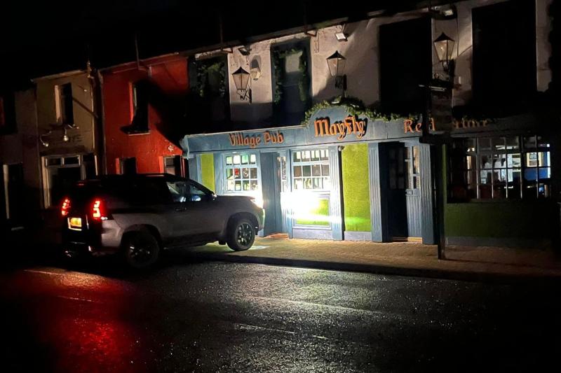 ‘No power, no problem’:  Irish pub uses car lights during Storm Isha