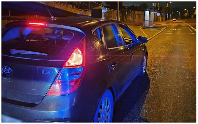 Kildare gardai catch driver with pint in cup holder after near miss on busy Irish road
