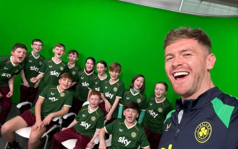 Ireland captain Nathan Collins surprises students from his former primary school in Kildare