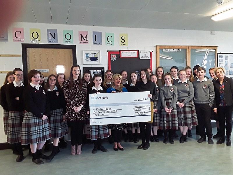 Kildare Town Community School  students hand over &euro;260 to help Pieta House