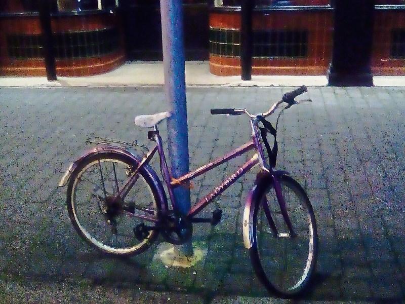 The pole and the lonely bike ... united on the Main Street of Newbridge