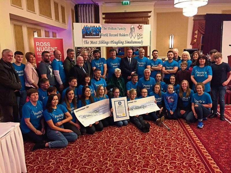 Kildare's Holton family present €52,000 to charities