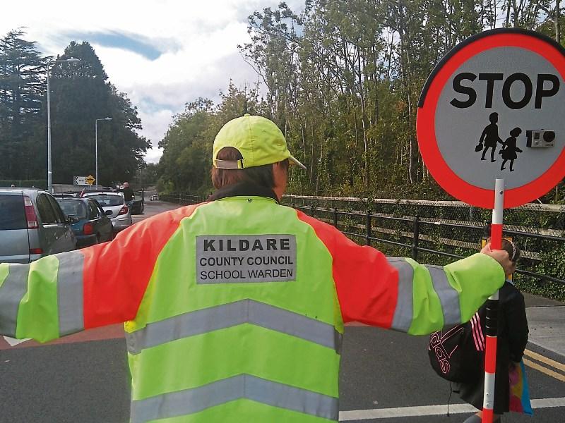 Schoolkids "within seconds" of being hit as Kildare lollipop lady has near miss with oncoming car