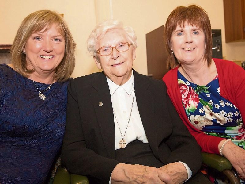 Newbridge classmates reunite to recreate school photo after 44 years