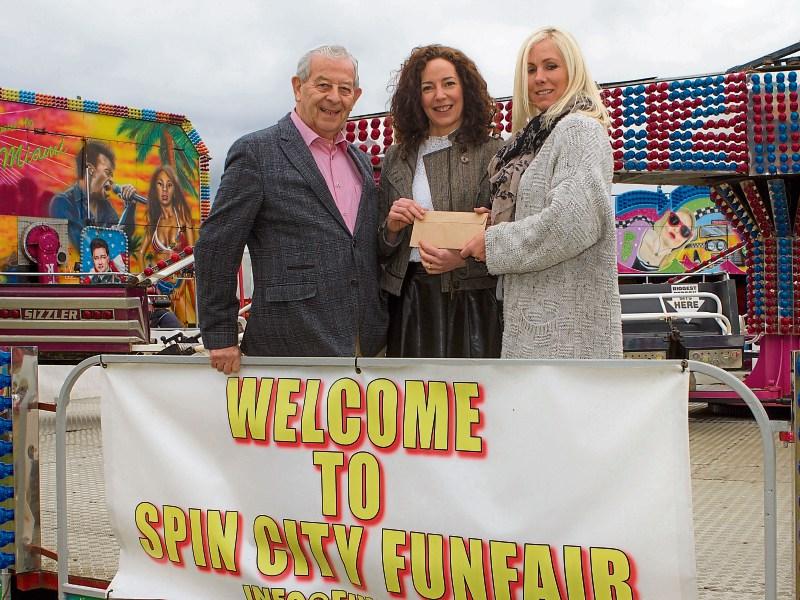 Naas funfair makes donation to Moat Club