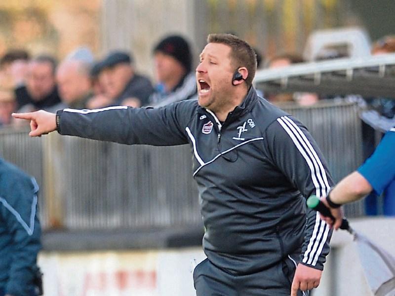 Cian O'Neill uses an unusual implement to train the Kildare team