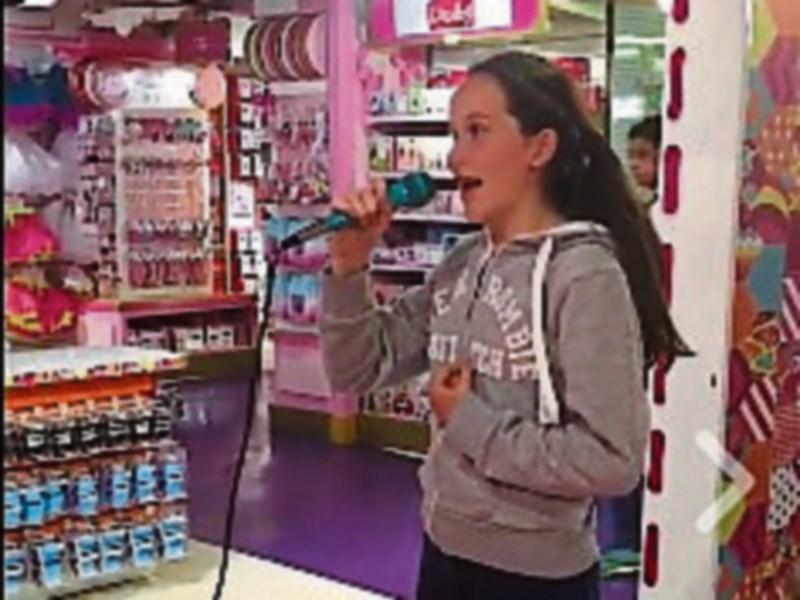 WATCH: Kildare schoolgirl goes viral for singing performance at London toy shop
