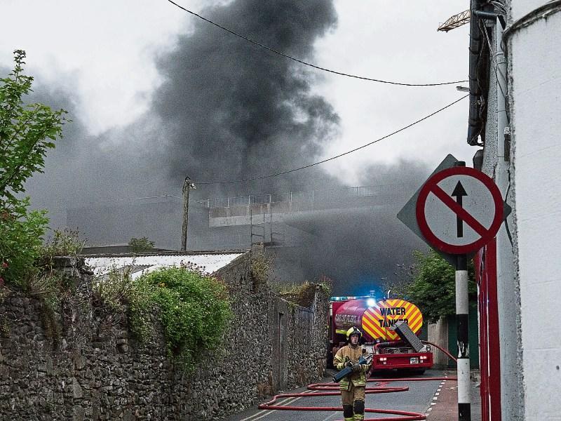 NAAS SHOPPING CENTRE FIRE: 'Builders Materials' were on fire