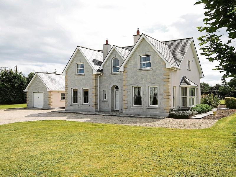 Exceptional detached Naas home with its own living-room bar