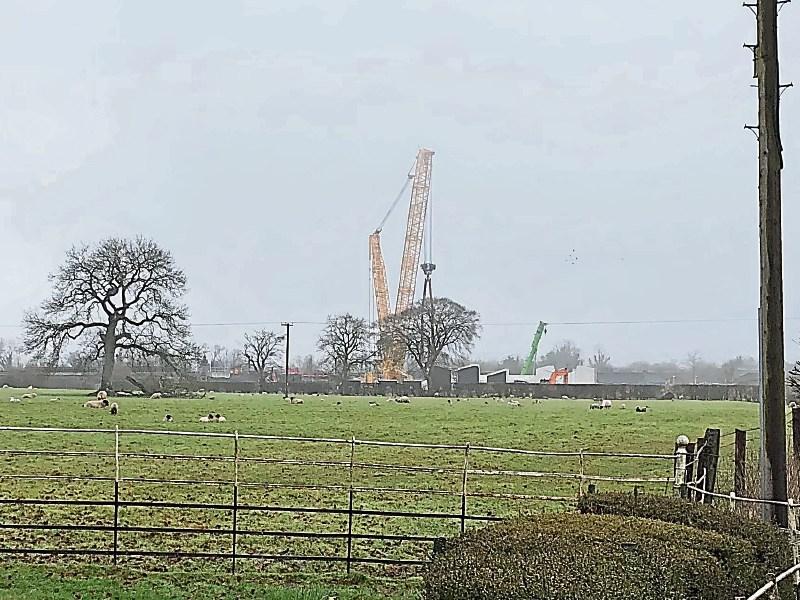 Cranes in place to build rail bridge as Kildare commuters travel by bus