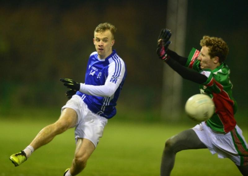 Monastrevan's Daniel Dee shoots past Colin O'Modhrain of Suncroft in the Tony Donohoe Trophies Under 21 Shield final at Hawkfield.