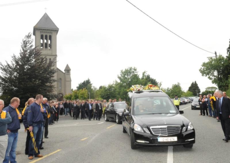 Paddy Power's funeral arrives to Caragh Church. Photo: Jimmy Fullam