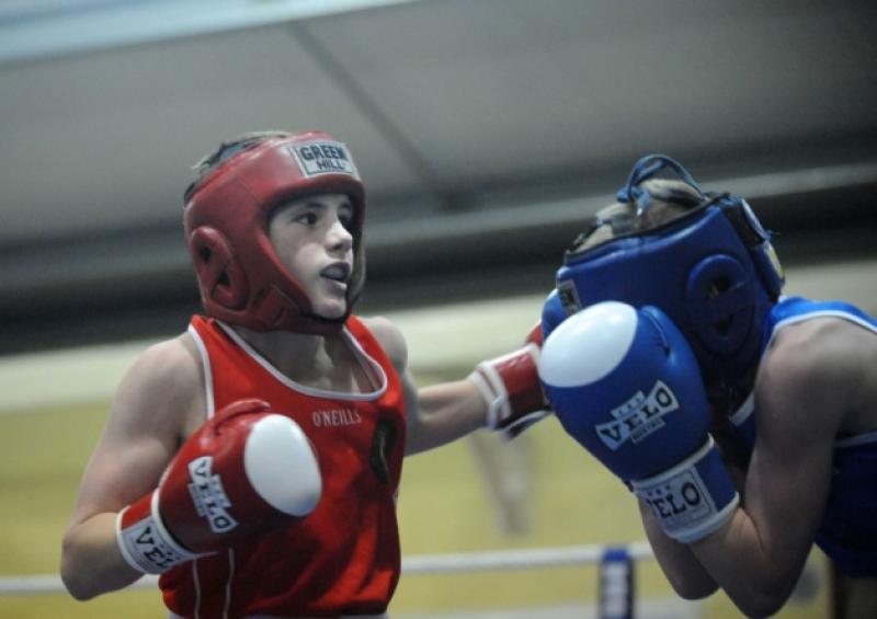 Willie Donoghue Athy, (red) winner over Jamie Conroy, Ballina (blue) in the St Michael's boxing club tournament, Athy.Photo: Adrian Melia