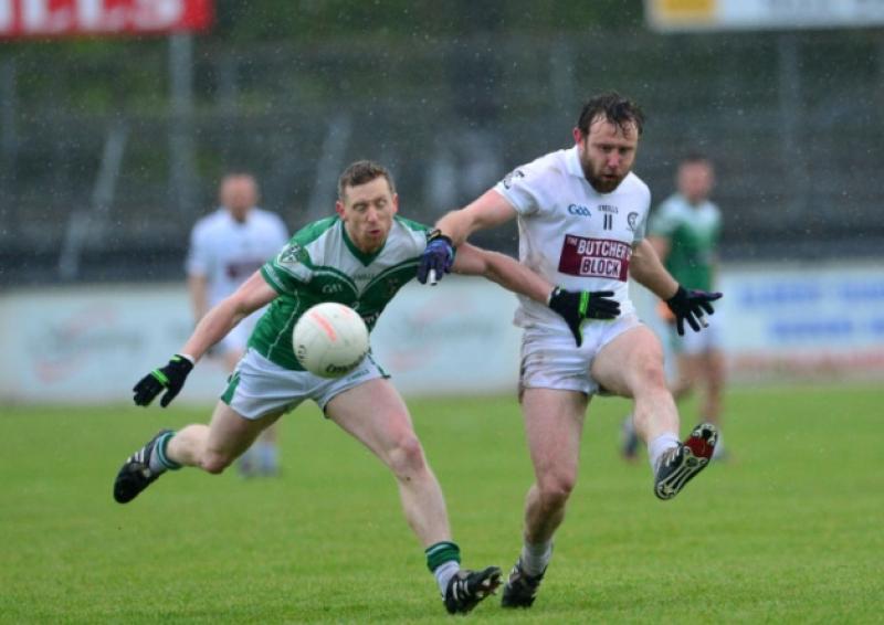 Clane's Robbie Dunne gets away from Liam Callaghan of Moorefield in the Joe Mallon Renault senior football championship game at St Conleth's Park, Newbridge.