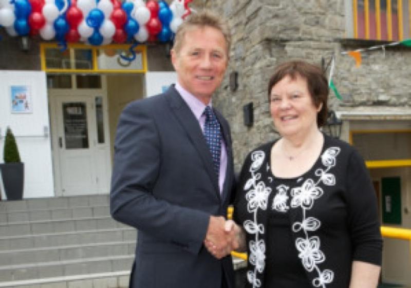 Mairead Byrne, Chairperson of the Celbridge Community Centre Ltd, welcomes special guest, Senator Eamonn Coughlan, to the The Mill for the launch of the recently improved facilities at the Centre, last week. Photo Tony Keane.