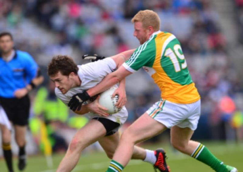 Kildare's Niall Kelly and Niall Darby of Offaly in the Leinster senior football quarter final at Croke Park. Photo Adrian Melia