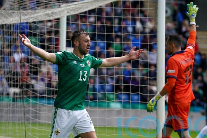 McMenamin cleared to return to Northern Ireland squad after singing controversy