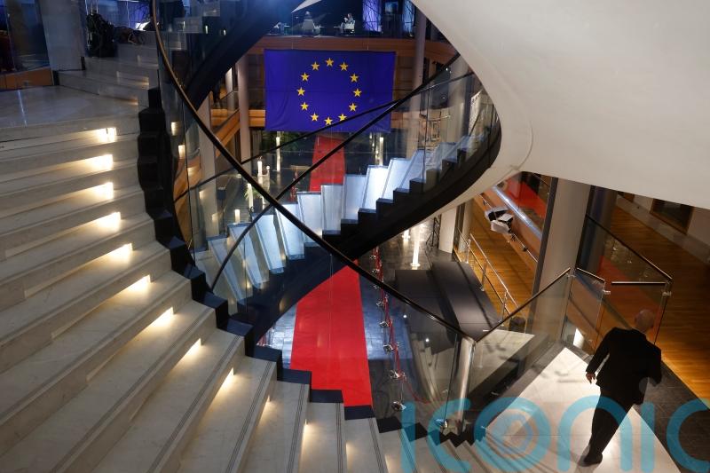 Four people charged with corruption as scandal continues to rock European Parliament