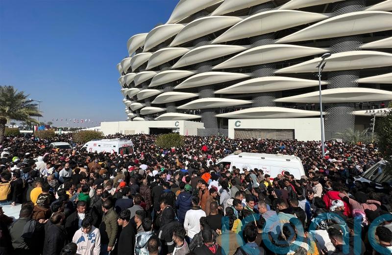 Two killed and dozens hurt in stampede outside football stadium