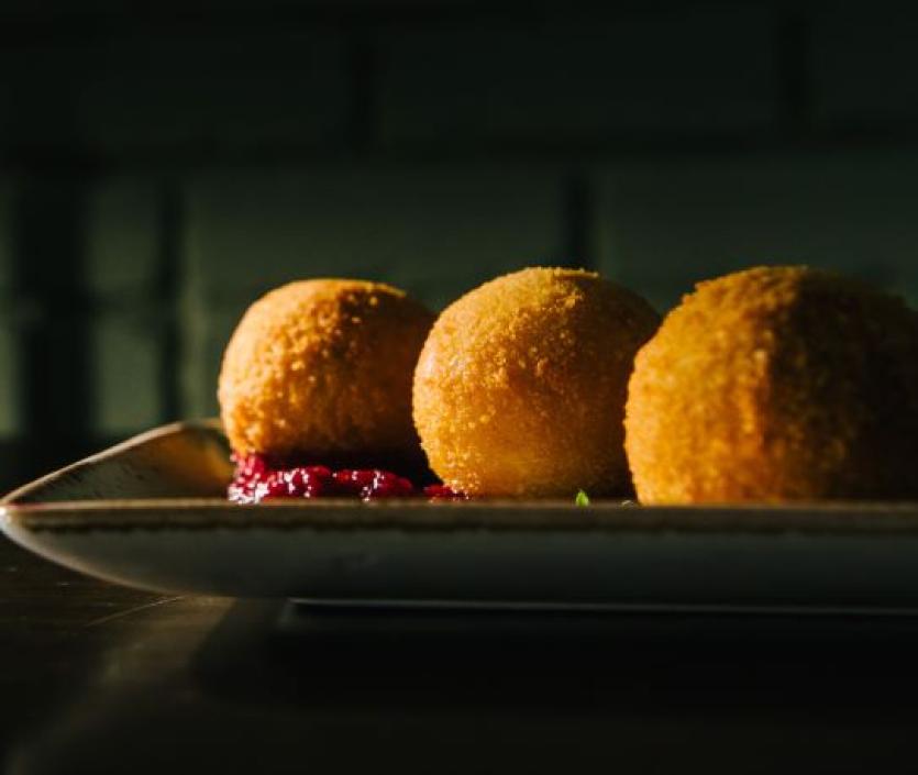 Deep fried brie with apple and cranberry sauce